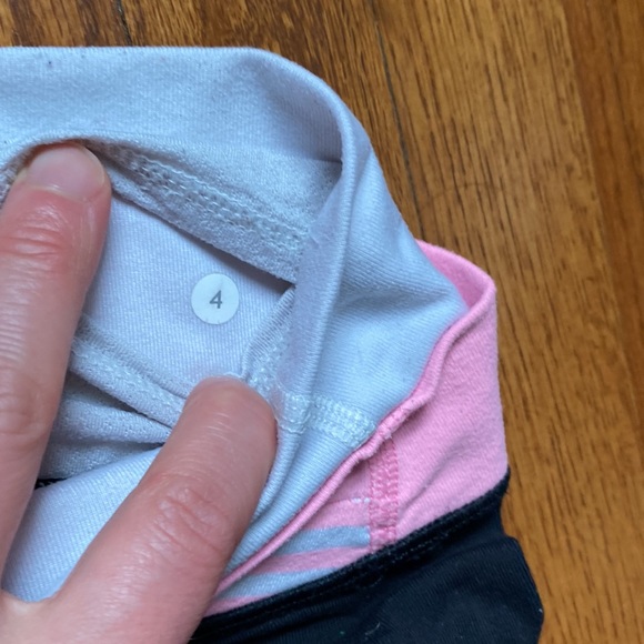 Lululemon black crops with pink and white waistband - Picture 2 of 4